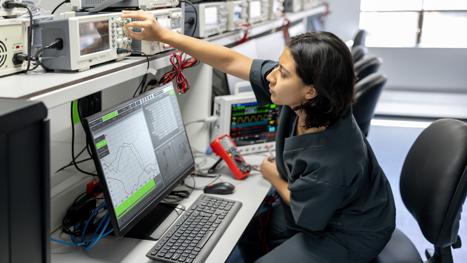 Female engineer repairing medical equipment at the hospital